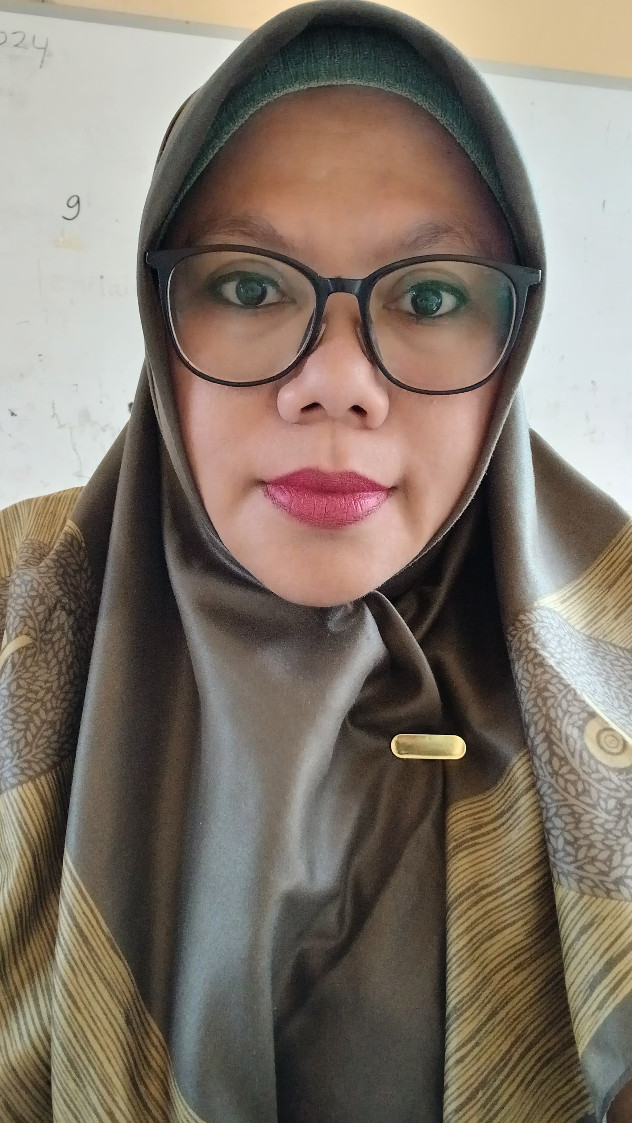 Hj. Neni Nuraeni, S.Pd